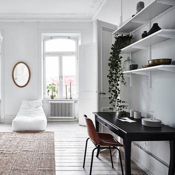 Interior design of home office in private house in scandinavian style.