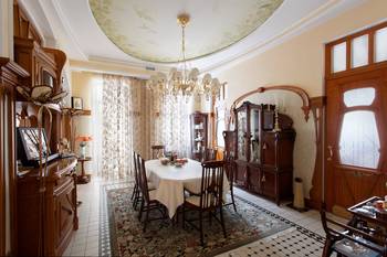 Beautiful example of dining room in cottage in Art Nouveau style.