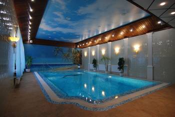 Interior design of pool in house in renaissance style.