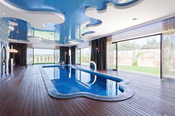 Beautiful design of pool in house in artistic style.