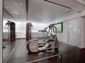 Interior of gym in cottage in contemporary style.