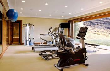 Gym in private house in artistic style.