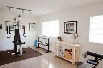 Gym interior in private house in scandinavian style.