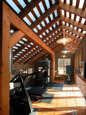 Beautiful example of gym in house in contemporary style.