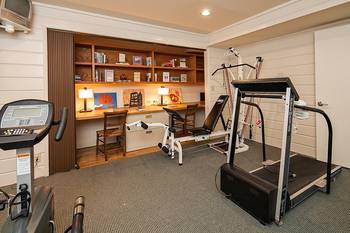 Design of gym in country house in Craftsman style.