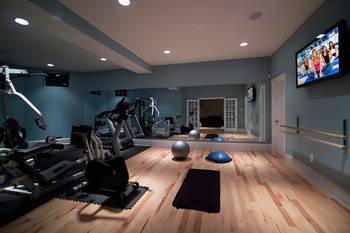 Design of gym in cottage in artistic style.