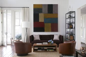 Modern Living Room with Abstract Art: Balance of Color and Texture in a Country House