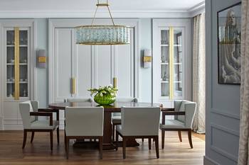 Interior design of dining room in country house in Art Deco style.