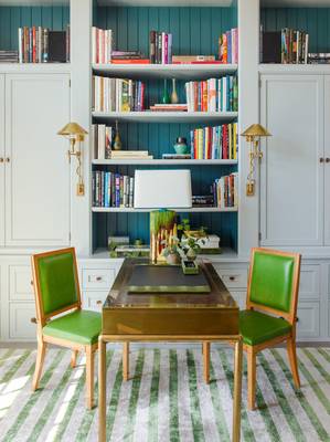 Library interior in private house in fusion style.