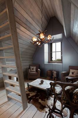 Attic in house in Chalet style.