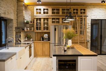 Beautiful design of kitchen in cottage in Chalet style.
