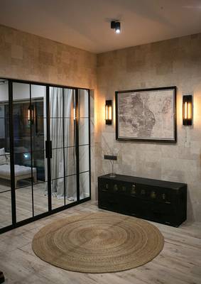 Modern Elegance: Travertine and Metal in Country House Interior
