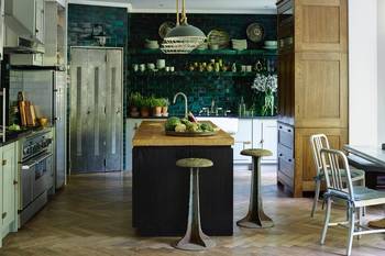 Interior design of kitchen in cottage in fusion style.