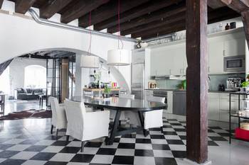 Photo of kitchen in house in loft style.