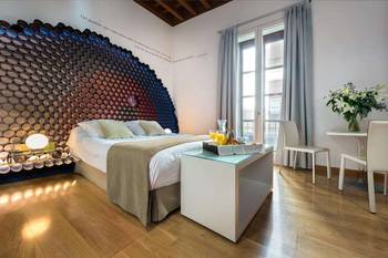 Modern Bedroom with Artistic Headboard: Fusion of Art and Functionality