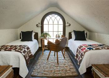 Photo of attic in country house in scandinavian style.