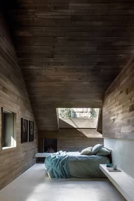 Photo of bedroom in house in contemporary style.
