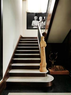 Photo of stairs in cottage in colonial style.