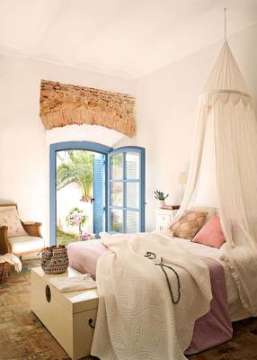 Beautiful interior of bedroom in country house.