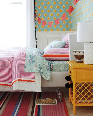 Eclectic Bedroom with Vibrant Accents: A Play of Textures and Patterns in a Country House