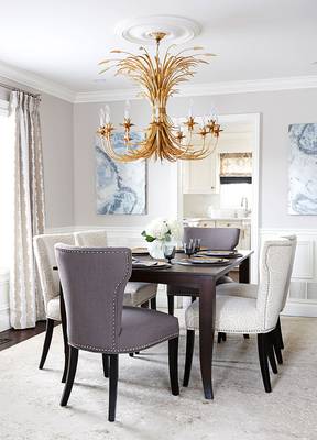 Interior design of dining room in house in empire style.