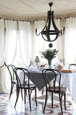 Dining room in country house in colonial style.