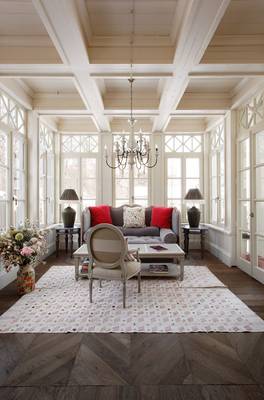 Bright Solarium with Coffered Ceiling: Classical Elegance in a Modern Country House