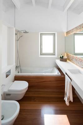 Elegant bathroom with wooden accents in a modern country house