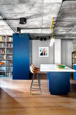 Beautiful design of library in private house in loft style.