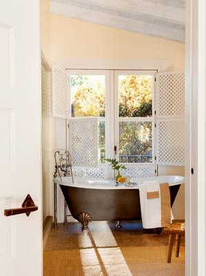 Design of bathroom in country house in Mediterranean style.