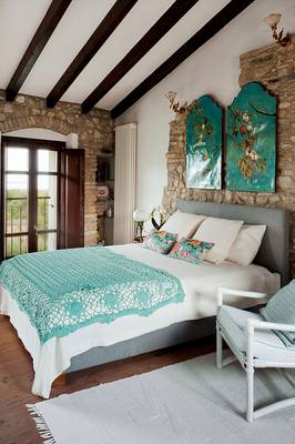 Bedroom interior in cottage in Chalet style.