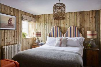 Bedroom interior in private house in scandinavian style.