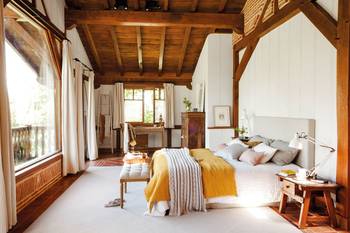 Beautiful example of bedroom in house in Chalet style.