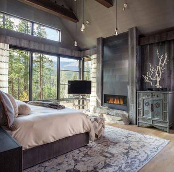 Bedroom design in house in Chalet style.