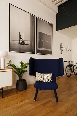 Minimalist Elegance: Blue Accent in a Monochrome Space