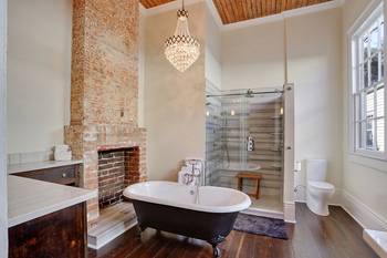 Bathroom in country house in loft style.
