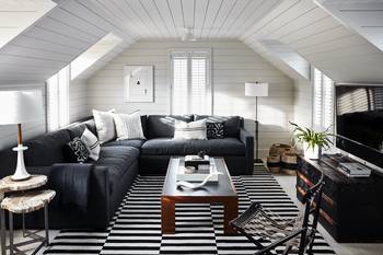 Beautiful design of attic in country house in scandinavian style.