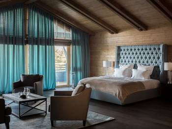 Photo of bedroom in house in Chalet style.