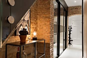 Beautiful design of hallway in country house in loft style.