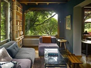 Library interior in private house in artistic style.