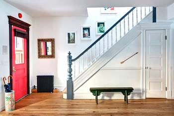 Interior design of stairs in private house in fusion style.