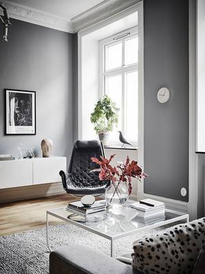 Gray Elegance: A Monochromatic Living Room with Classic Details