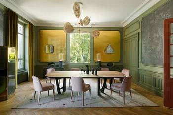 Dining room design in private house in artistic style.