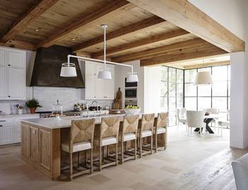 Design of kitchen in cottage in loft style.