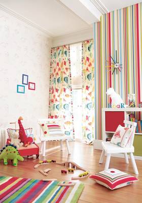 Vibrant children's room with striped accent: balance of color and functionality