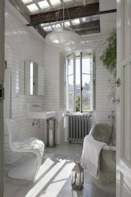 Bathroom interior in cottage in loft style.