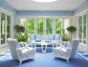 Coastal Elegance: Blue and White Solarium with Panoramic Windows