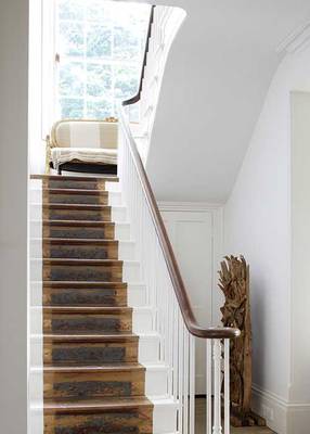 Photo of stairs in house in Craftsman style.