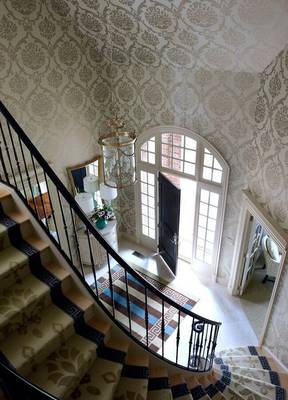 Photo of stairs in private house in empire style.