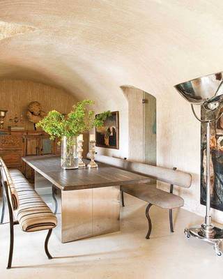 Beautiful example of dining room in cottage in Mediterranean style.